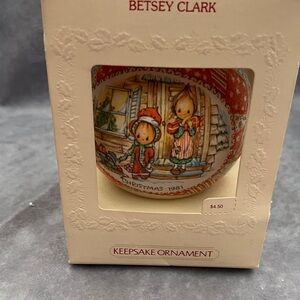 Hallmark Patchwork Ornament with Orange and Green Accents.
Betsy Clark Ornament